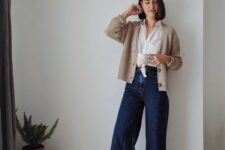 31 a white tied up shirt, a neutral cardigan, navy wide leg jeans, grey loafers are a lovely look that you may wear all the time