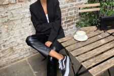 32 a stylish work outfit with a white top, black leather pants, a black blazer, black platform sneakers plus a small bag