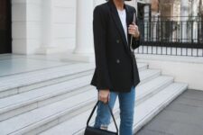 33 a stylish work outfit with a white t-shirt, blue cropped jeans, black heeled shoes, a black crossbody bag
