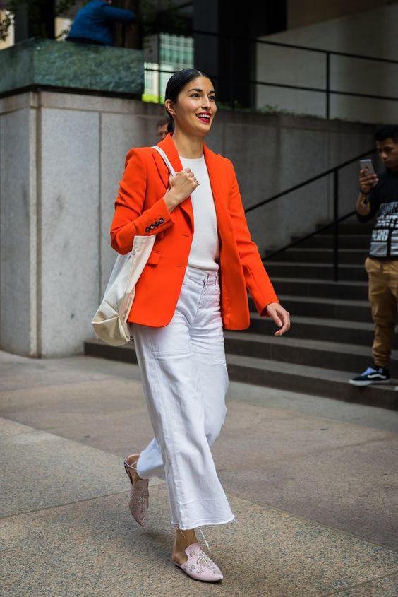 a white top, white jeans, blush slippers, a canvas bag and an orange blazer are a great spring look