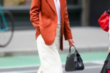 36 a white t-shirt, creamy jeans, a rust-colored blazer, black heels and a black bag are a great combo for spring and fall