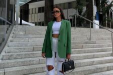39 a white crop top, white ripped jeans, a green oversized blazer, black bag, black heels are great for summer