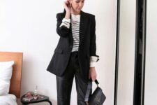 41 an elegant work outfit with a Breton strip top, black leather pants, black bow shoes, a black blazer and a cool bag