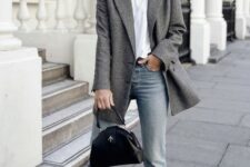 43 a white tee, a grey blazer, blue cropped jeans and black shoes with ankle straps