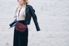 With beige fitted turtleneck, purple suede crossbody bag and black leather ankle strap high heels