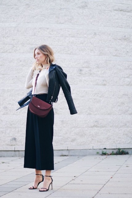 With beige fitted turtleneck, purple suede crossbody bag and black leather ankle strap high heels