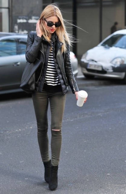 With black and white striped shirt, black leather tote bag, sunglasses and black suede ankle boots