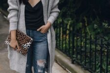 With black top, leopard printed clutch and white embellished flat mules