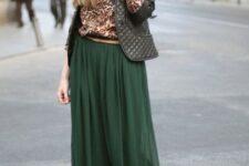With black wide brim hat, sunglasses, leopard printed shirt, beige leather belt and brown high heeled shoes