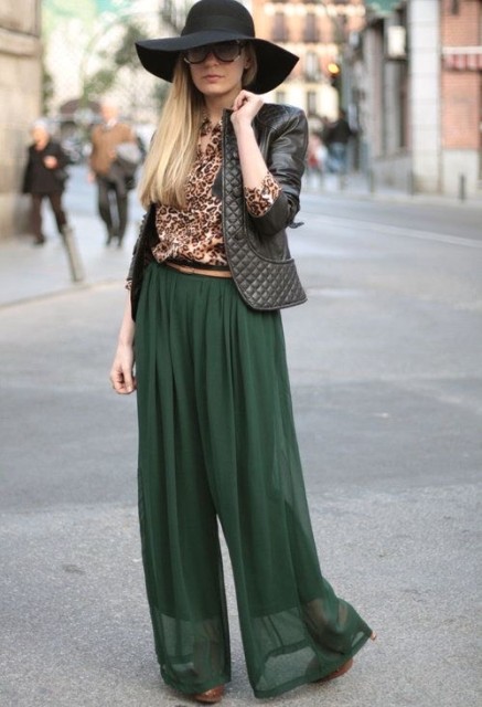 With black wide brim hat, sunglasses, leopard printed shirt, beige leather belt and brown high heeled shoes