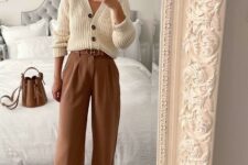 With brown leather belt, white lace up flat shoes and brown leather bag