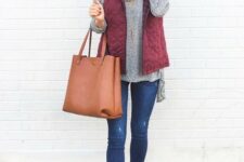 With oversized sunglasses, gray ruffled shirt, brown leather tote bag and brown suede ankle boots