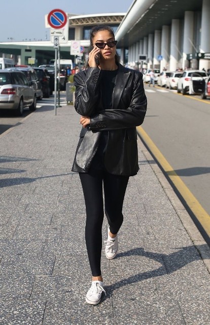 With sunglasses, black shirt and white lace up flat shoes