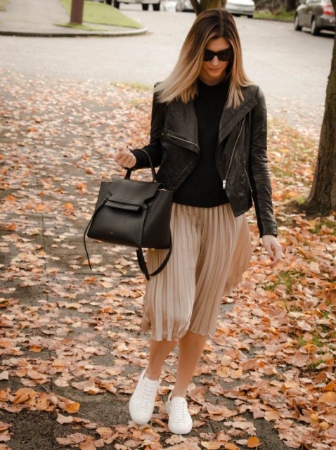 With sunglasses, black turtleneck, black leather tote bag and white lace up flat shoes