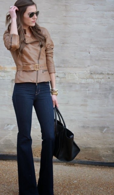 With sunglasses, top and black leather tote bag