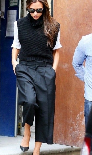 With sunglasses, white shirt and black leather pumps
