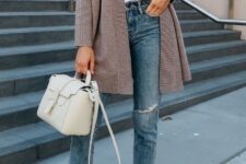 With white t-shirt, cream colored leather bag and beige leather flat shoes