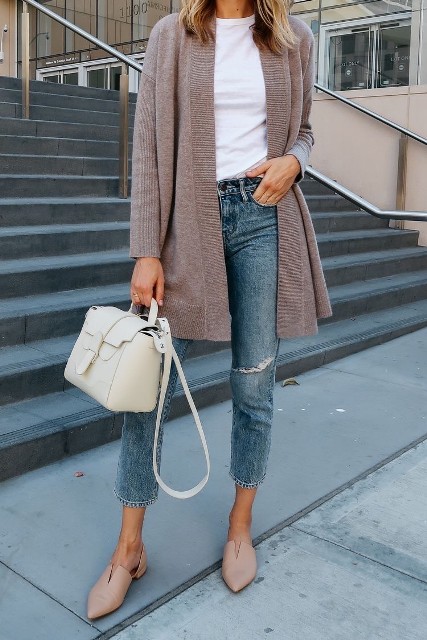 With white t shirt, cream colored leather bag and beige leather flat shoes