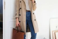 a classic beige knee trench with black buttons is a stylish idea that will never go out of style