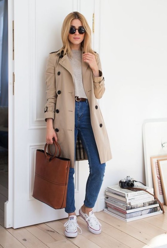 a classic beige knee trench with black buttons is a stylish idea that will never go out of style