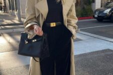 a sophisticated minimalist look with a black tee, velvet palazzo pants, black shoes, a black bag and a beige oversized trench