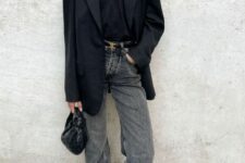 a sophisticated monochromatic look with a black tee, a black oversized blazer, black heels, a black hobo bag and grey jeans