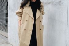 a tan oversized double-breasted trench with bold buttons and large pockets for spring