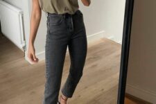 an olive green t-shirt, grey mom jeans, black strappy heels are a lovely and simple look with a touch of elegance