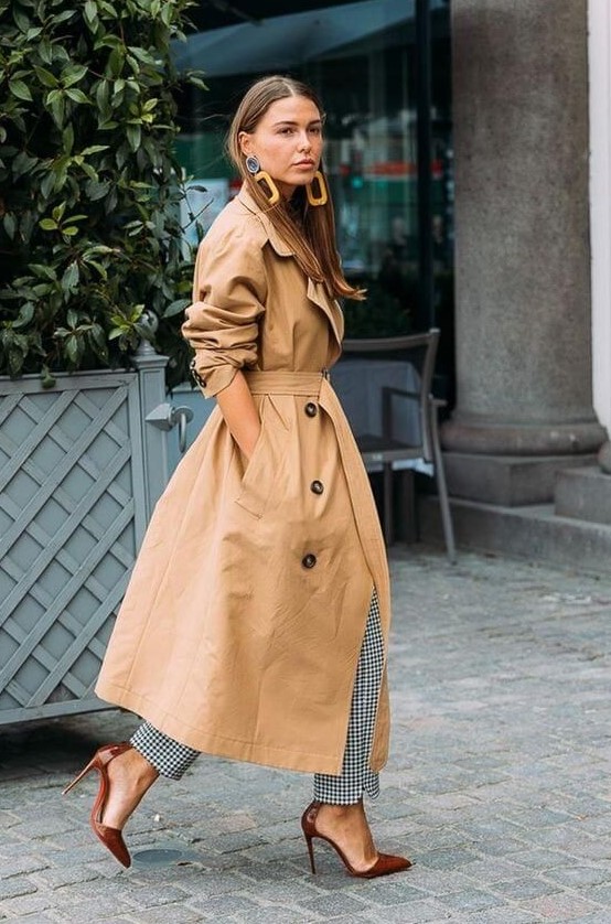 an oversized tan double-breasted midi trench is a classic idea that won't go out of style and will look awesome