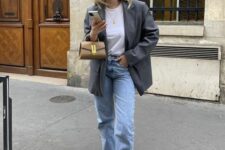 08 a casual everyday look with a white t-shirt, bleached jeans, white sneakers, an oversized grey blazer, a beige bag
