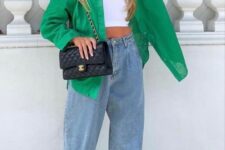 08 a white crop top, bleached baggy jeans, green Jordans, a matching green button down and a black bag with chain