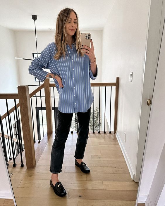 a blue striped shirt, black jeans, black loafers are an easy and elegant outfit for spring