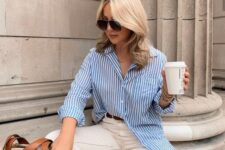 12 a blue striped shirt, neutral pants, a straw bag and sunglasses are a timeless look for spring and summer