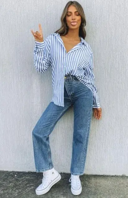 a simple and classy spring look with a blue stripe shirt, blue jeans, white high top sneakers works anytime