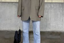 16 a white t-shirt, an oversized grey blazer, white trainers and socks and a black bag with chain are great for spring