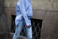16 an oversized blue striped shirt, blue bleached jeans, mustard-colored boots for a stylish fall look