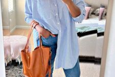 18 an oversized blue striped shirt, blue skinnies, red shoes and an amber tote plus red lipstick for spring