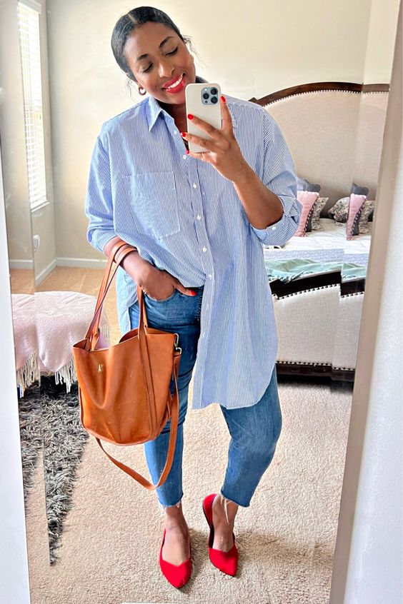 an oversized blue striped shirt, blue skinnies, red shoes and an amber tote plus red lipstick for spring