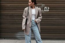 26 a white t-shirt, bleached blue jeans, black sneakers, an oversized grey blazer and a black bag are a nice and comfy look for spring