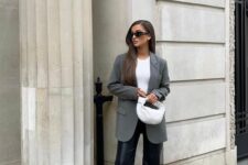 29 a minimalist outfit with a white bodysuit, black leather pants, an oversized grey blazer and a white woven bag is suitable for work