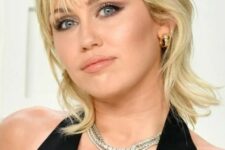 Miley Cyrus wearing a traditional mullet and the shag, with heavy layers and volume at the crown, thinning toward the ends