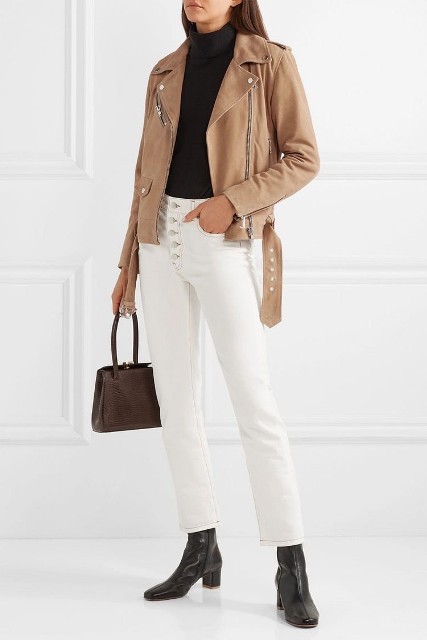 With black fitted turtleneck, brown leather bag and black leather low heeled mid calf boots