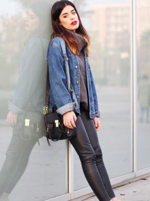 With dark gray turtleneck sweater, black leather bag and flat shoes