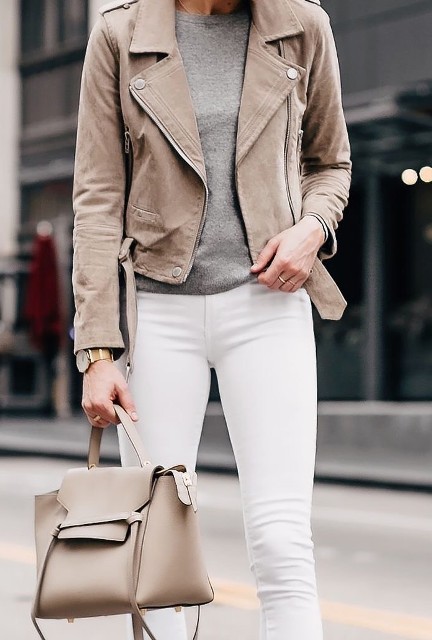 With gray sweatshirt and beige leather tote bag