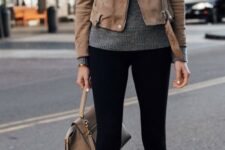 With gray turtleneck sweater, white sneakers and beige leather bag