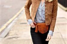 With sunglasses, white and blue striped button down shirt and brown suede waist bag with a fringe