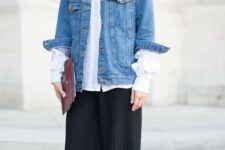 With white button down long sleeved shirt, marsala leather clutch and black and white sneakers