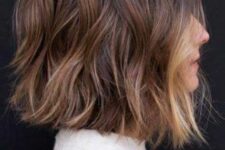 a brown choppy bob with caramel highlights and blonde face-framing locks and aves is a lovely idea that looks catchy and bold
