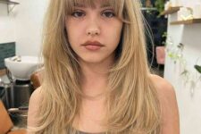 a lovely hairstyle with layered bangs