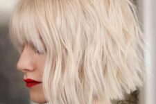 a fabulous icy blonde choppy bob with outgrown bangs is a gorgeous idea to rock right now